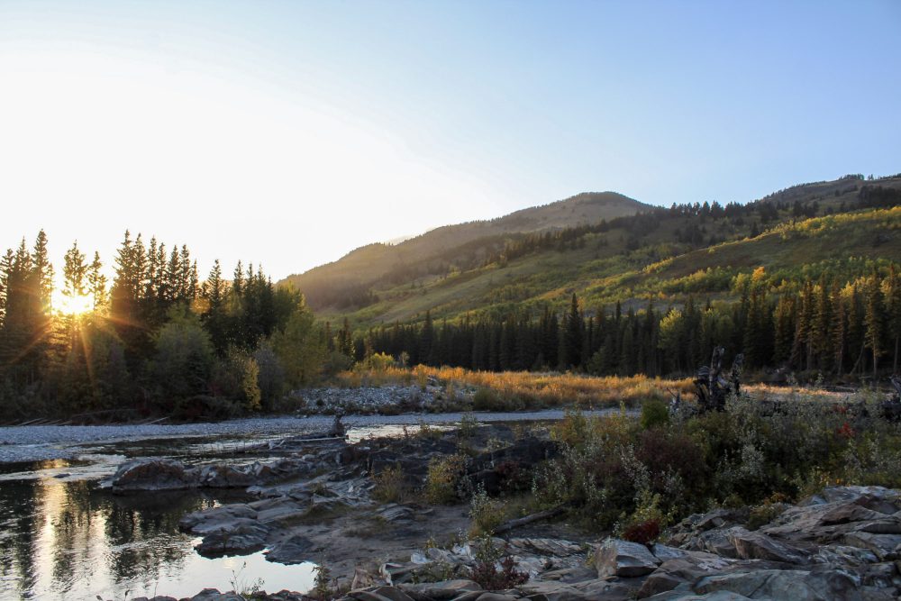 Sunset over a foothills river valley